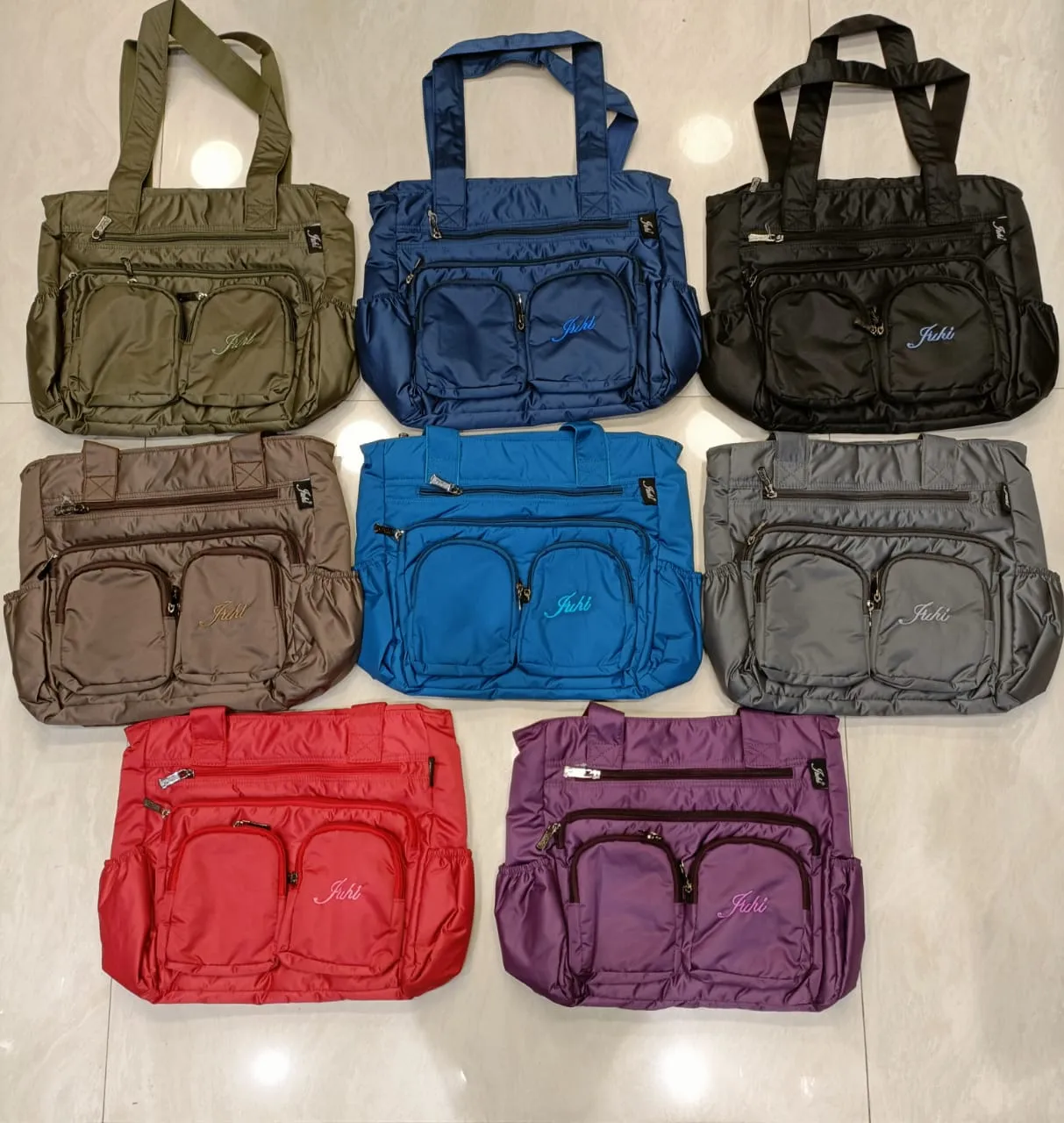 Abc's 8 pocket, soft fabric washable handbag