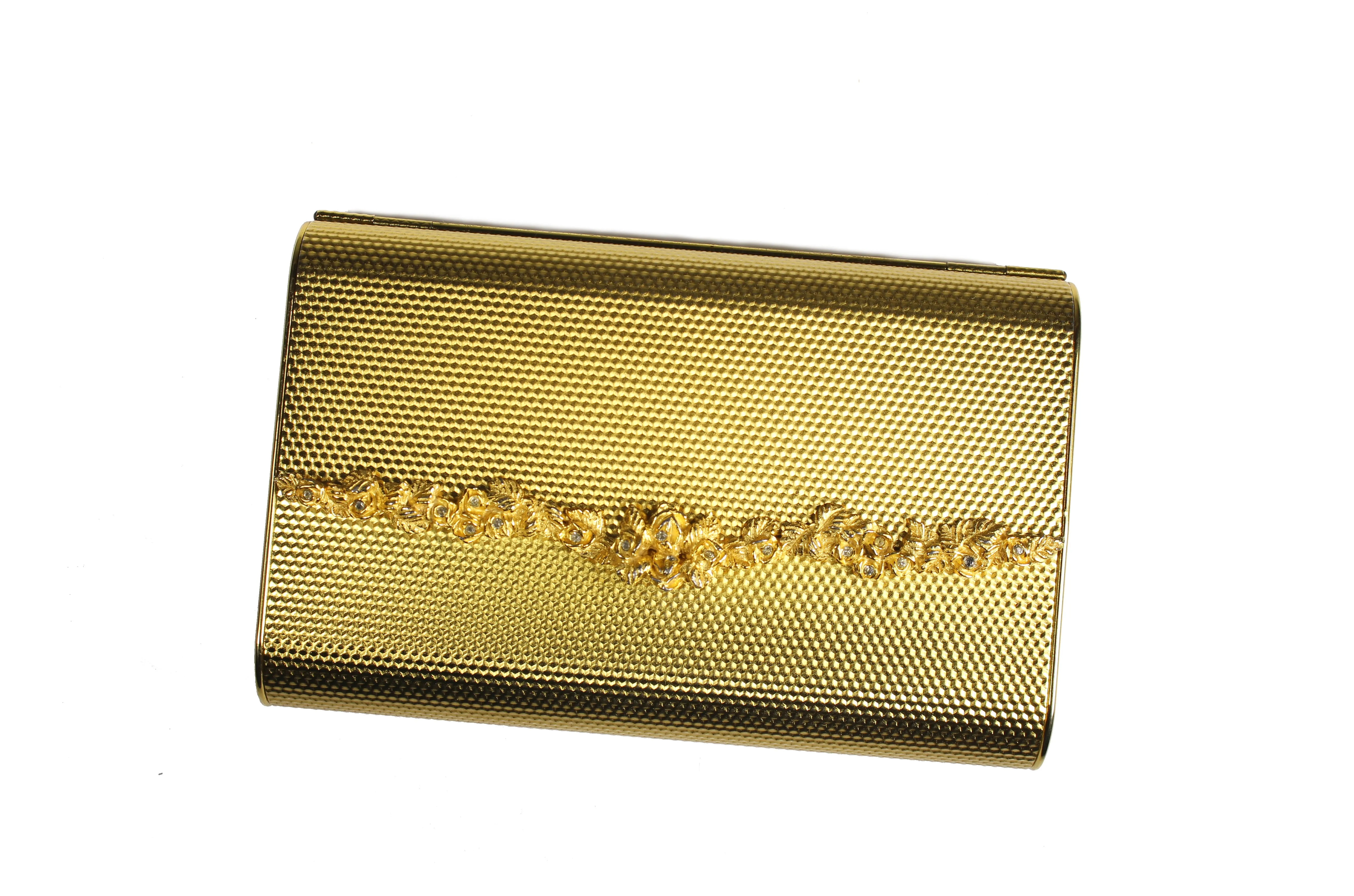 COBLENTZ embossed golden metal clutch