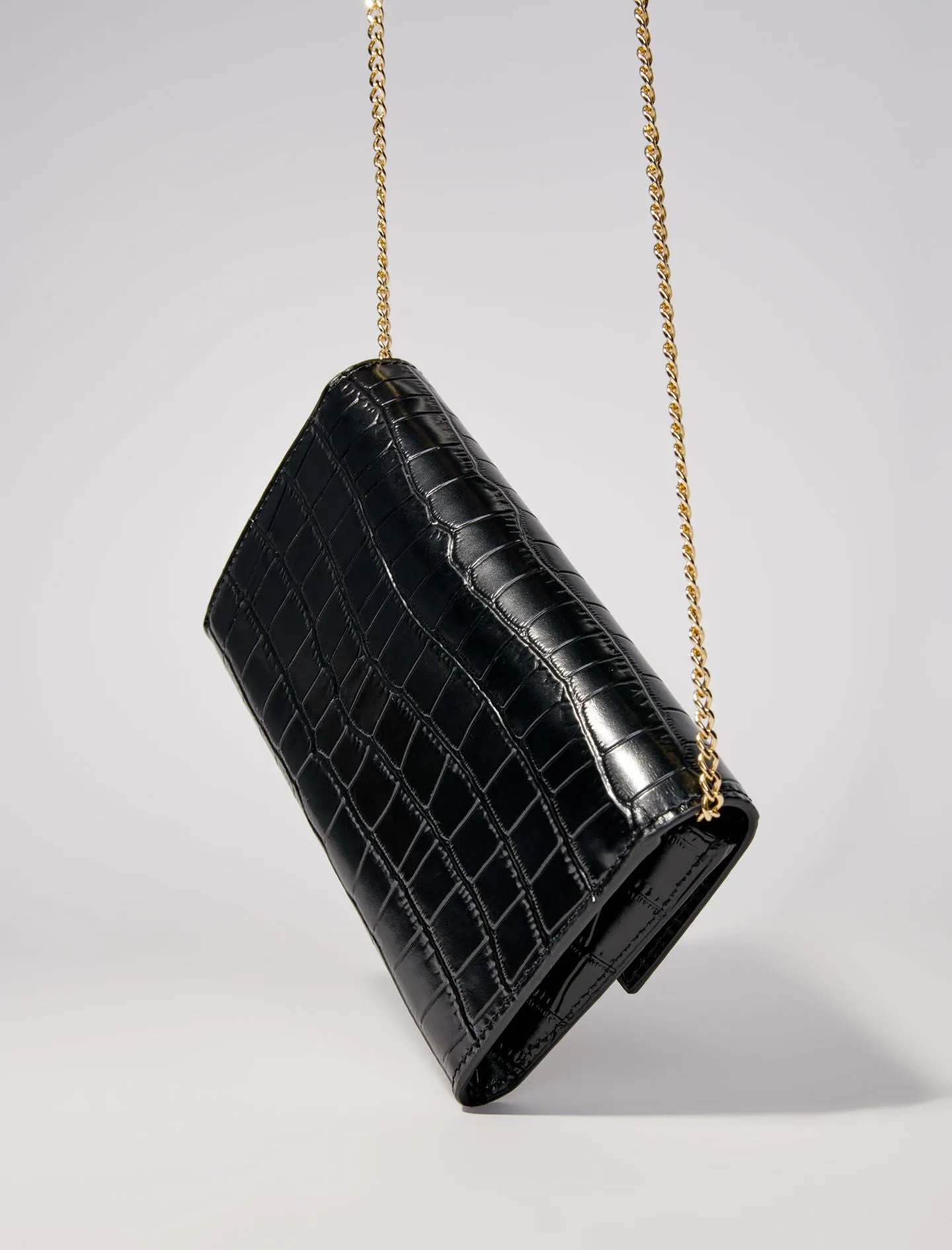 Croc-effect embossed leather bag