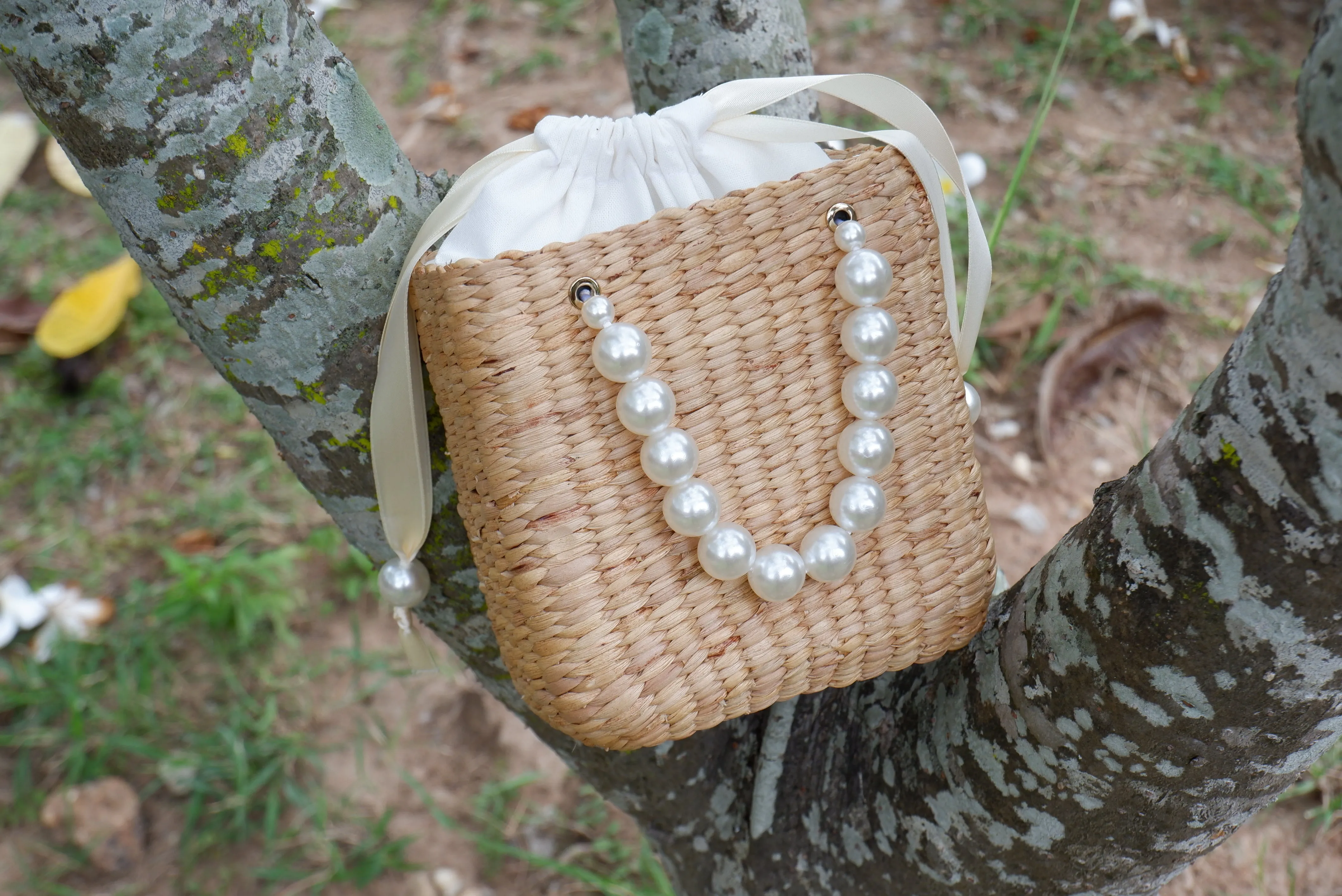 pearl beaded straw bag