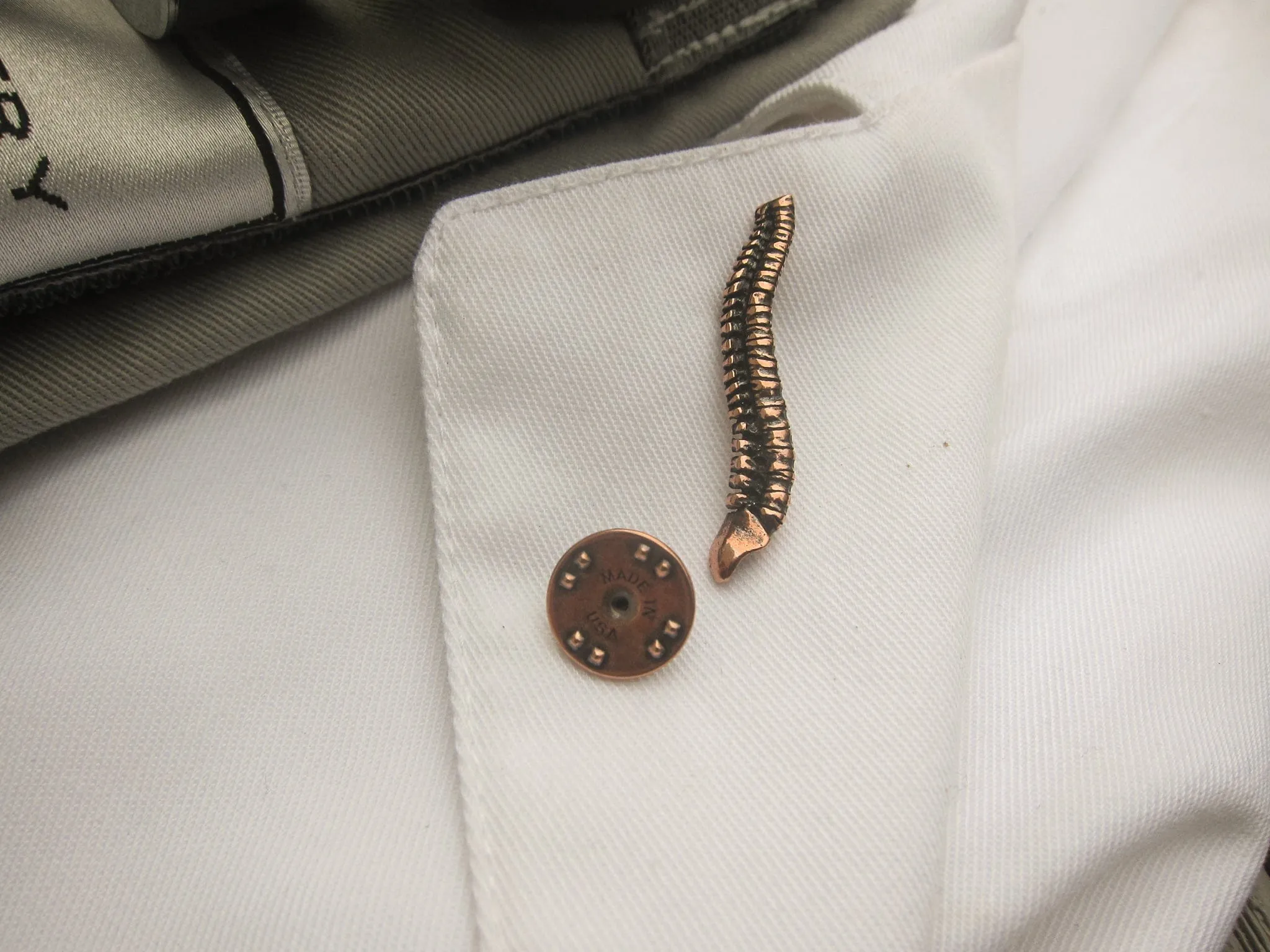 Spine Copper Lapel Pin