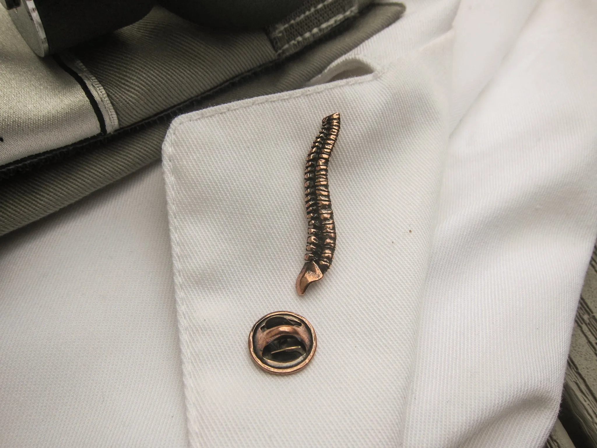 Spine Copper Lapel Pin